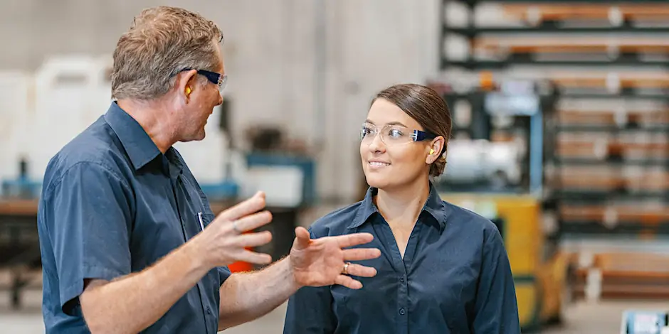 Image of two people in a workshop